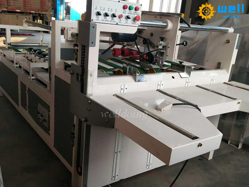 semi-automatic double piece box gluing machine