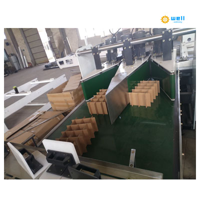 Automatic corrugted carton partition assembler