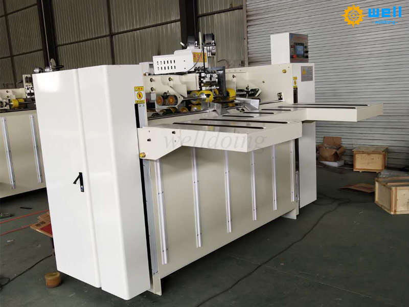 Semi automatic carton box stitching machine operating